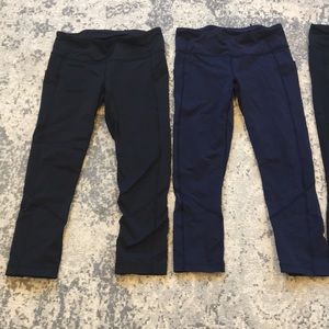 Four Lulu Lemon cropped workout pants